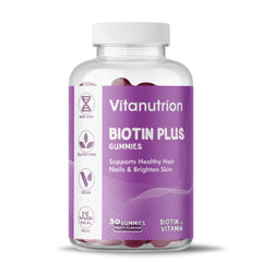 Bottle of Vitanutrition Biotin Plus Gummies on a white background