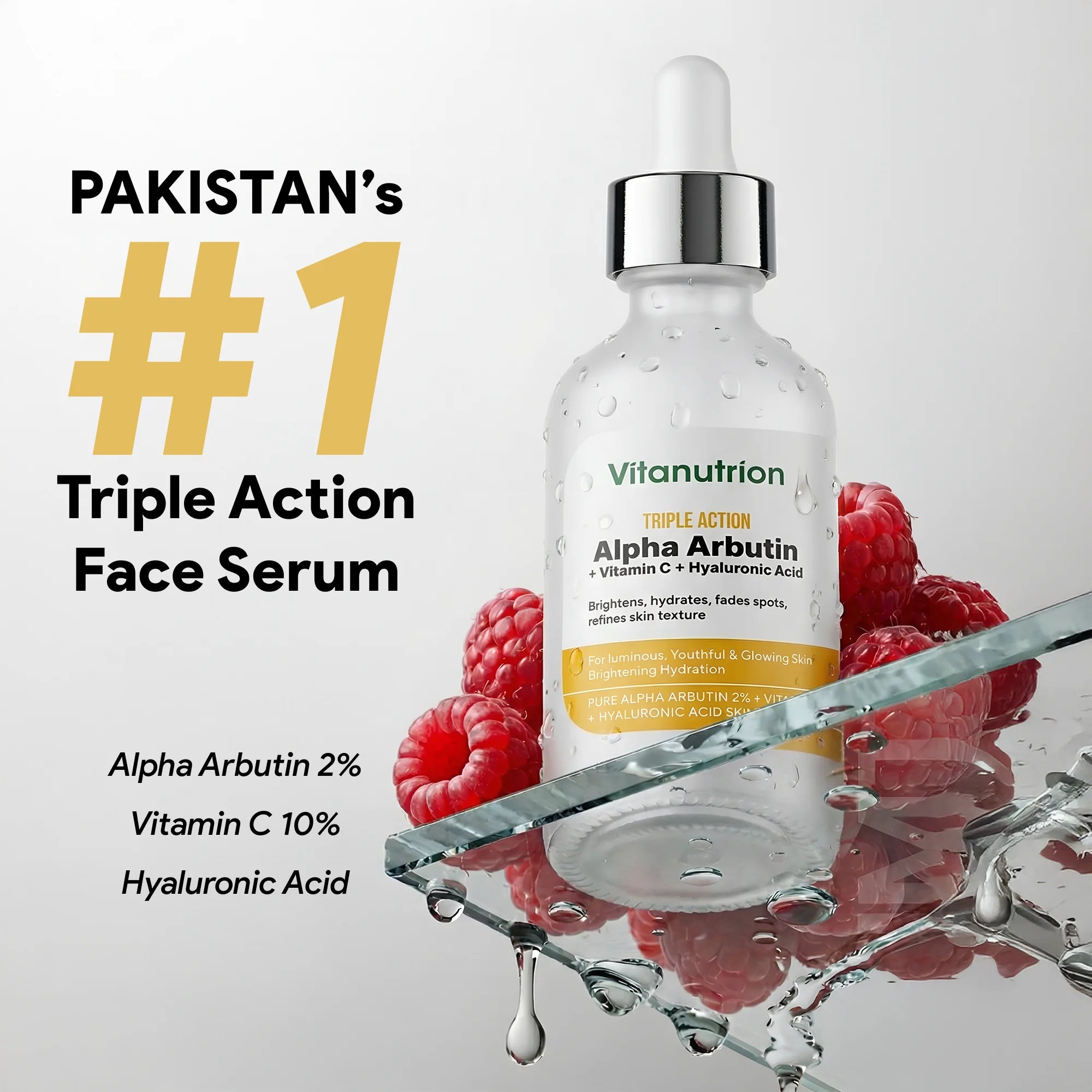 Vitanutrition triple-action face serum bottle with raspberries on a gray background